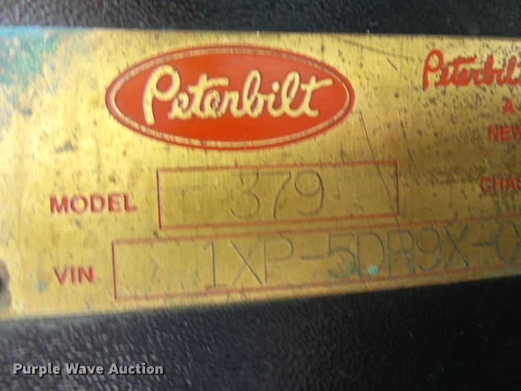 image for item DE8025 1990 Peterbilt 379 flatbed truck