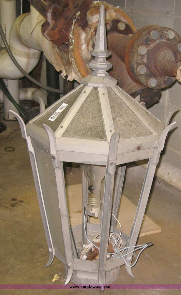 image for item 8210 General Electric metal and glass lamp