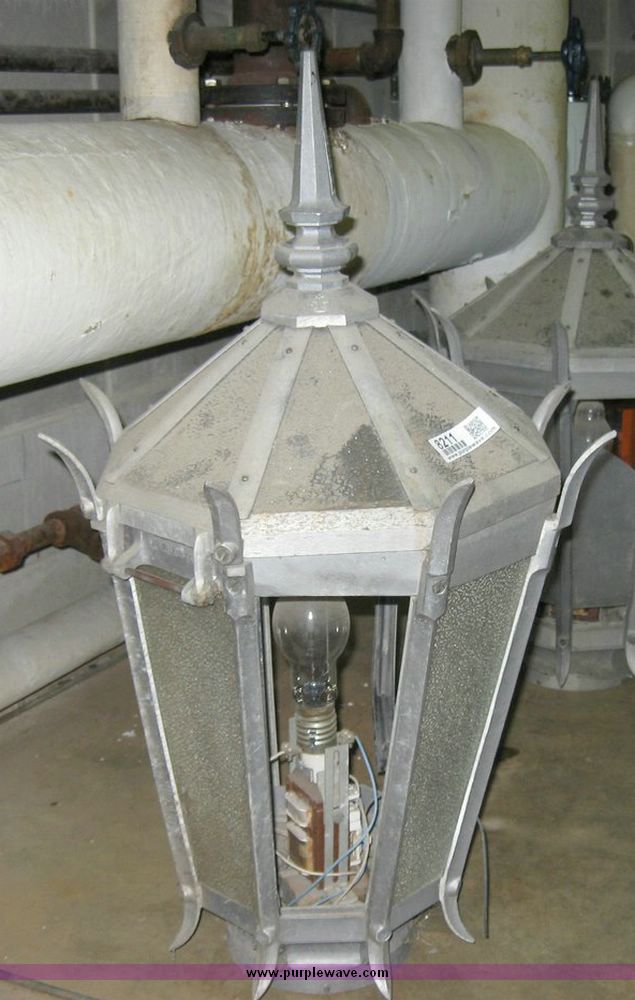 image for item 8211 General Electric metal and glass lamp