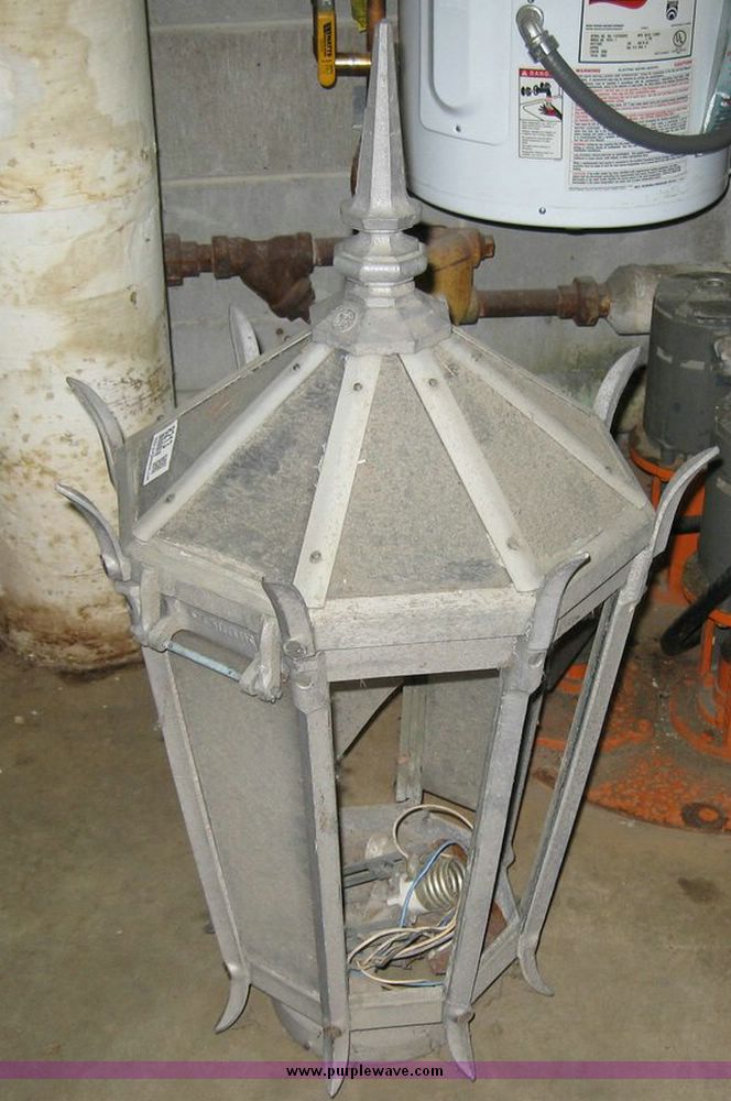 image for item 8213 General Electric metal and glass lamp