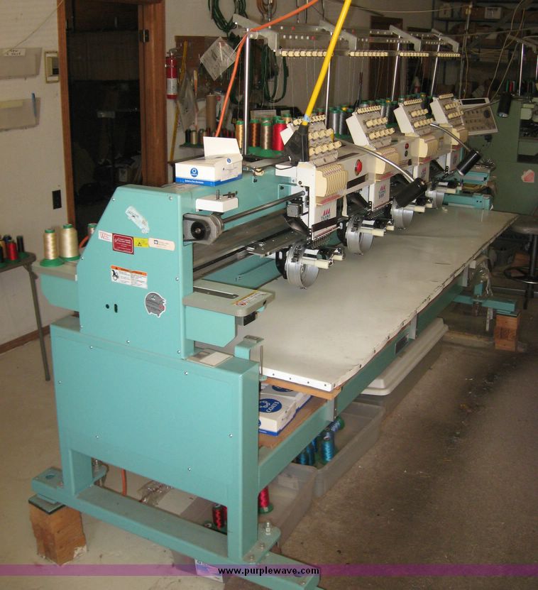 image for item 2661 Tajima Industrial Sewing Machine Company electronic multi head automatic embroidery machine