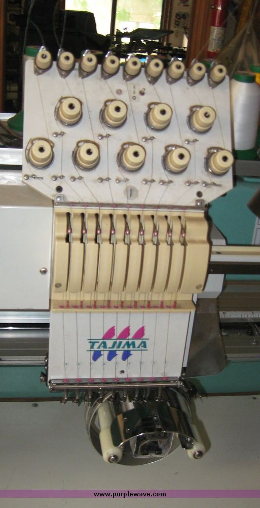 image for item 2661 Tajima Industrial Sewing Machine Company electronic multi head automatic embroidery machine