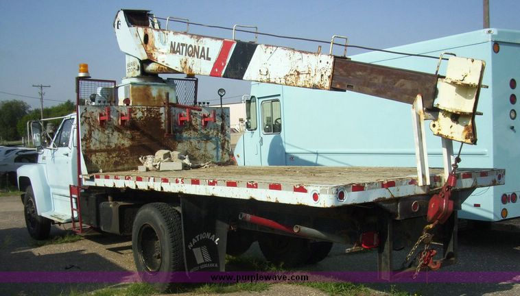 image for item 4488 1985 Ford F700 crane truck