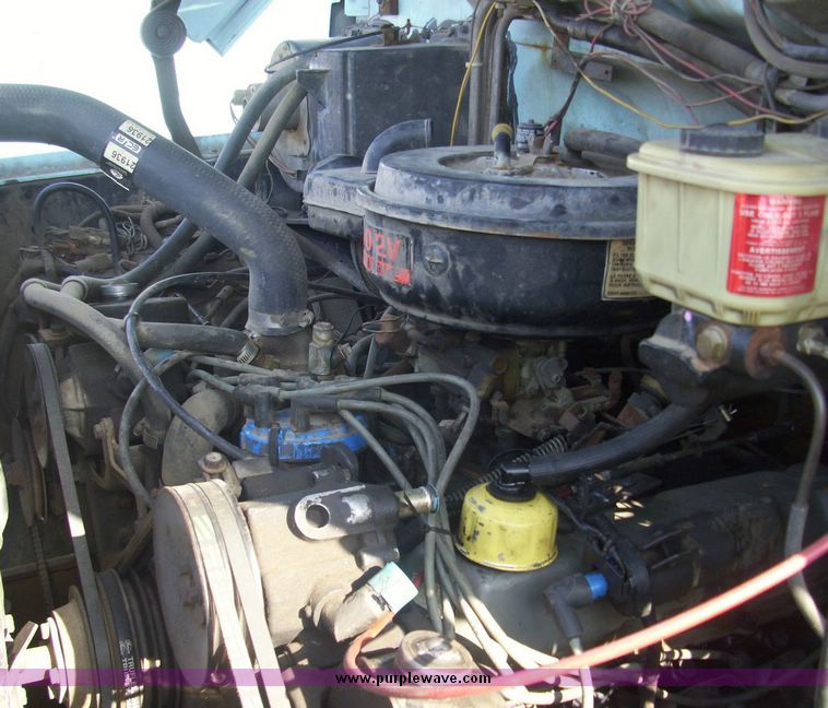 image for item 4488 1985 Ford F700 crane truck