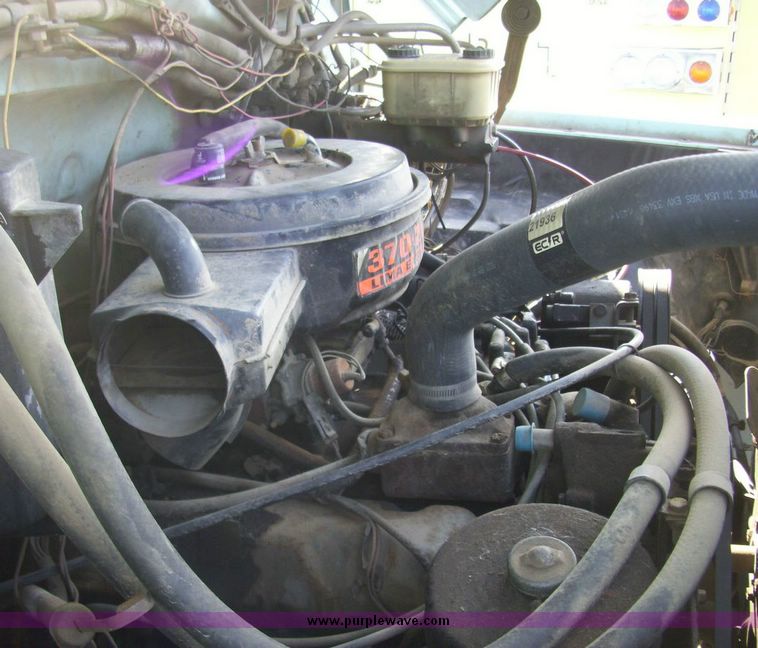 image for item 4488 1985 Ford F700 crane truck