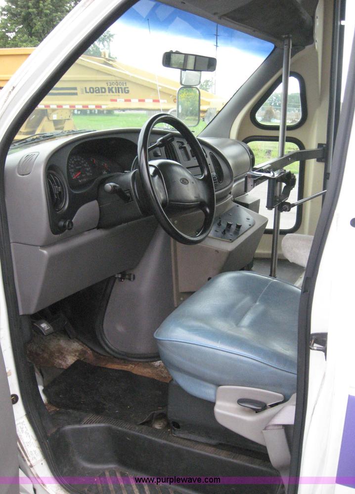 image for item 8587 1998 Ford E350 13-passenger bus