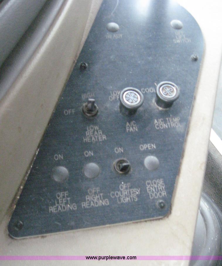 image for item 8587 1998 Ford E350 13-passenger bus