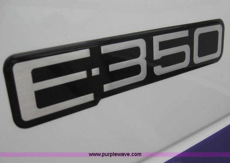 image for item 8587 1998 Ford E350 13-passenger bus