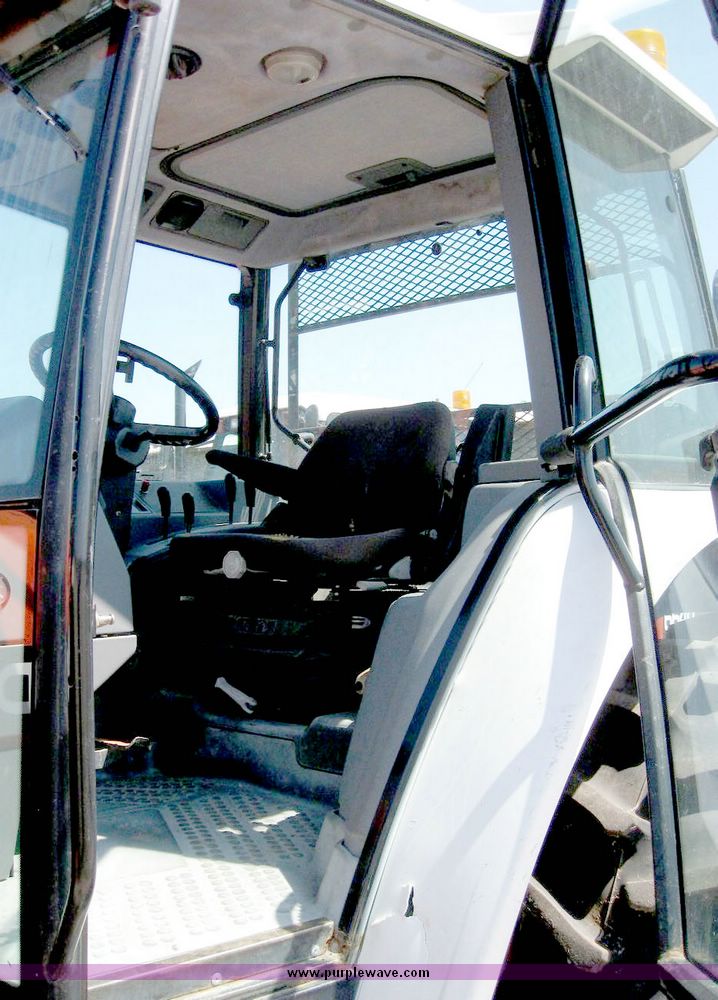 image for item 5255 1996 New Holland 6640SL tractor