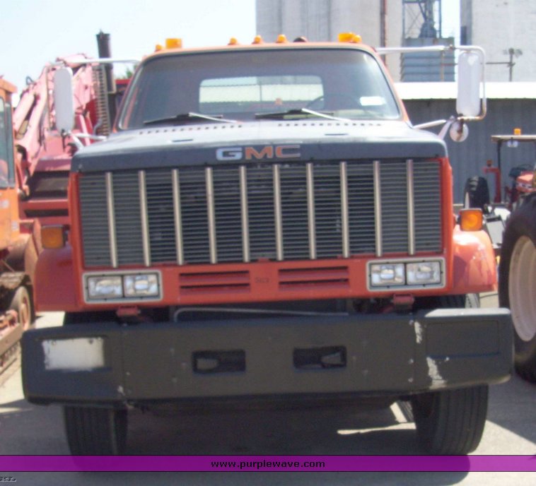 image for item 5349 1985 GMC Top Kick ME6500 C7D064 rollback truck