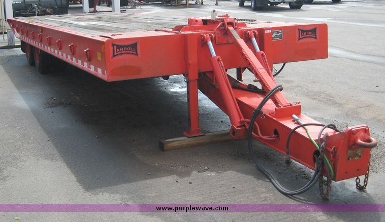 image for item 8557 1988 Landoll tandem slide axle tilt top 20 ton trailer with winch