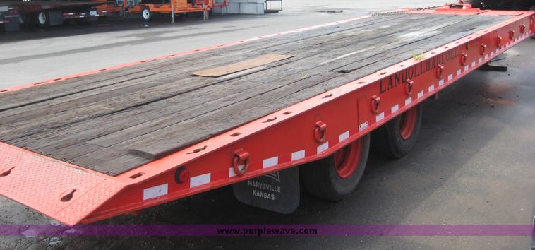image for item 8557 1988 Landoll tandem slide axle tilt top 20 ton trailer with winch