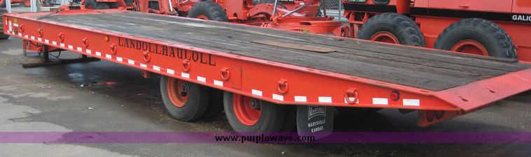 image for item 8557 1988 Landoll tandem slide axle tilt top 20 ton trailer with winch