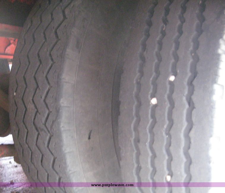 image for item 8557 1988 Landoll tandem slide axle tilt top 20 ton trailer with winch