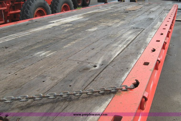 image for item 8557 1988 Landoll tandem slide axle tilt top 20 ton trailer with winch