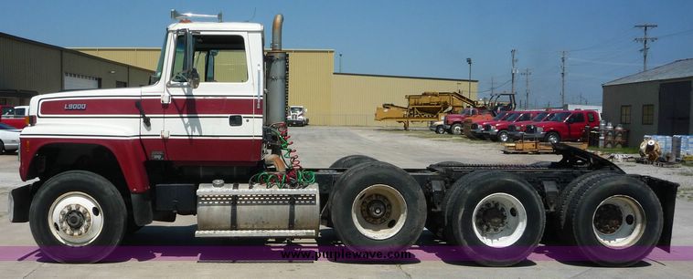 image for item 4038 1995 Ford Conventional L9000 triple axle semi truck