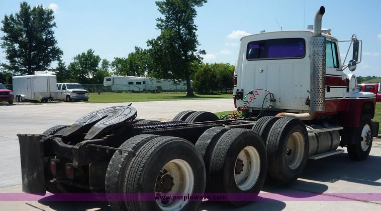 image for item 4038 1995 Ford Conventional L9000 triple axle semi truck