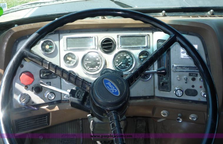 image for item 4038 1995 Ford Conventional L9000 triple axle semi truck