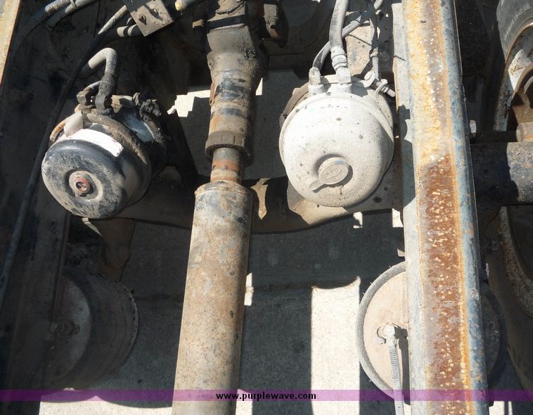 image for item 4038 1995 Ford Conventional L9000 triple axle semi truck