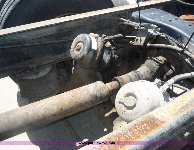 image for item 4038 1995 Ford Conventional L9000 triple axle semi truck