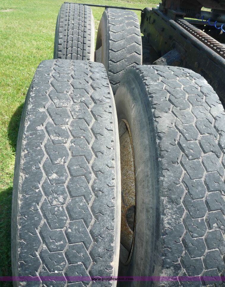 image for item 4038 1995 Ford Conventional L9000 triple axle semi truck