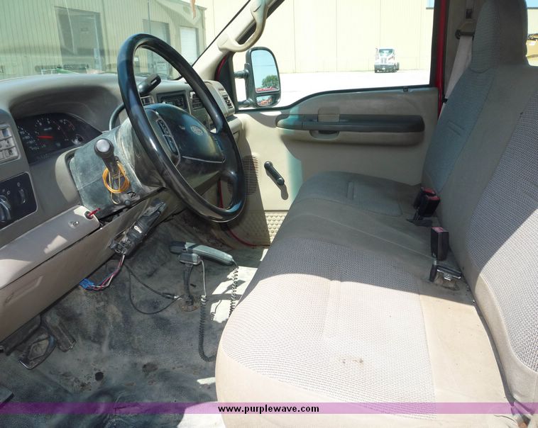 image for item 4043 2002 Ford F350 Super Duty crew cab pickup with Reading utility bed