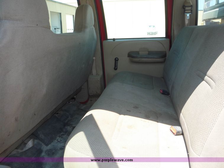 image for item 4043 2002 Ford F350 Super Duty crew cab pickup with Reading utility bed