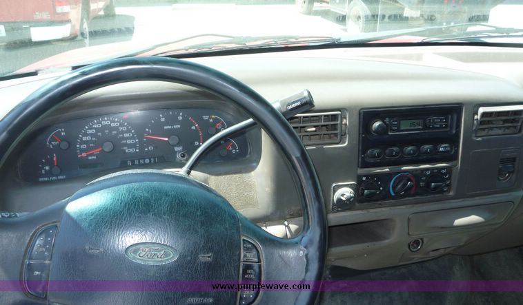 image for item 4043 2002 Ford F350 Super Duty crew cab pickup with Reading utility bed