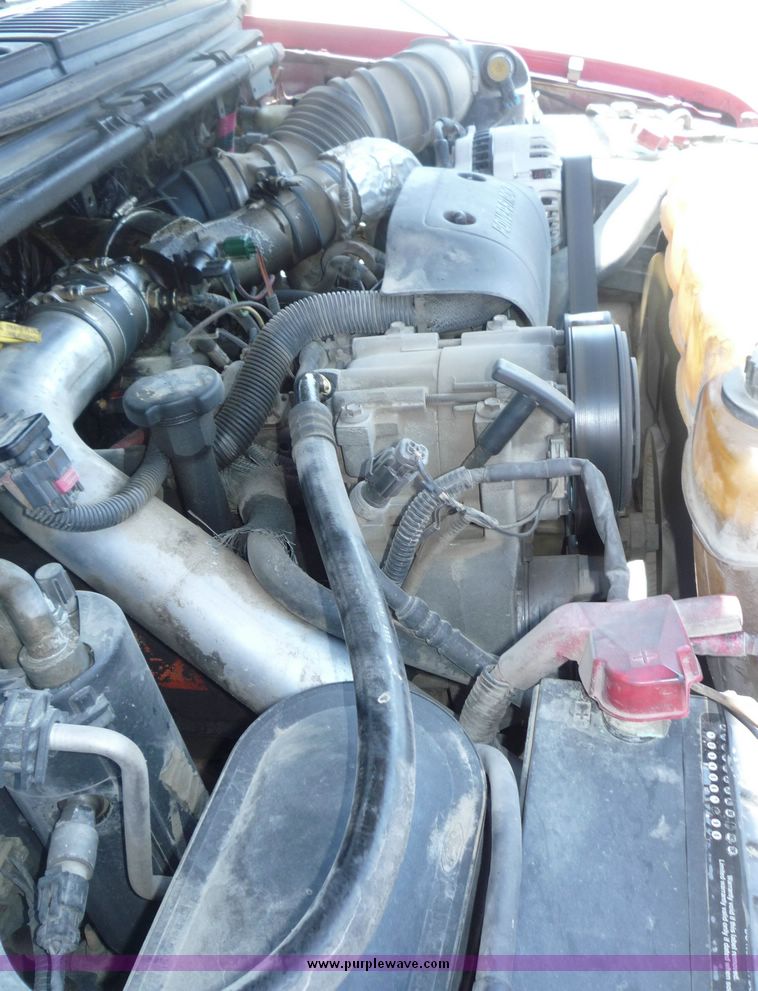 image for item 4043 2002 Ford F350 Super Duty crew cab pickup with Reading utility bed