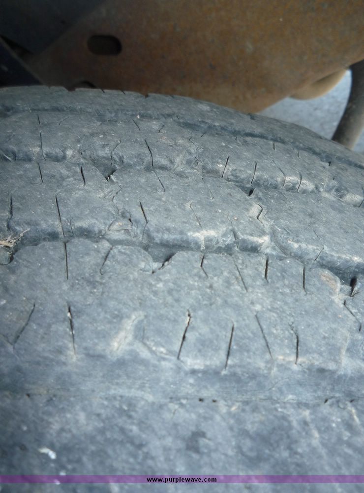 image for item 4043 2002 Ford F350 Super Duty crew cab pickup with Reading utility bed