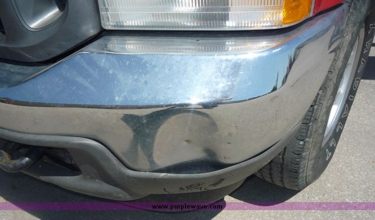 image for item 4043 2002 Ford F350 Super Duty crew cab pickup with Reading utility bed