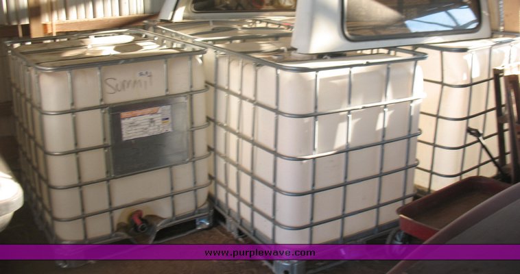 image for item 4391 (5) 250 gallon plastic totes