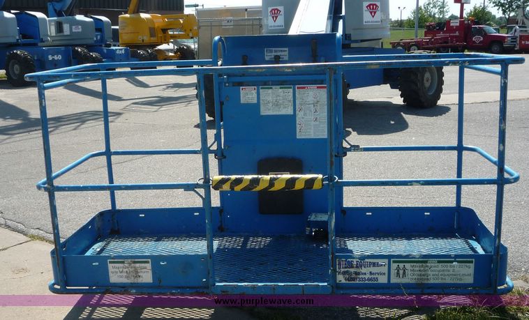 image for item 5061 Genie S-65 boom lift