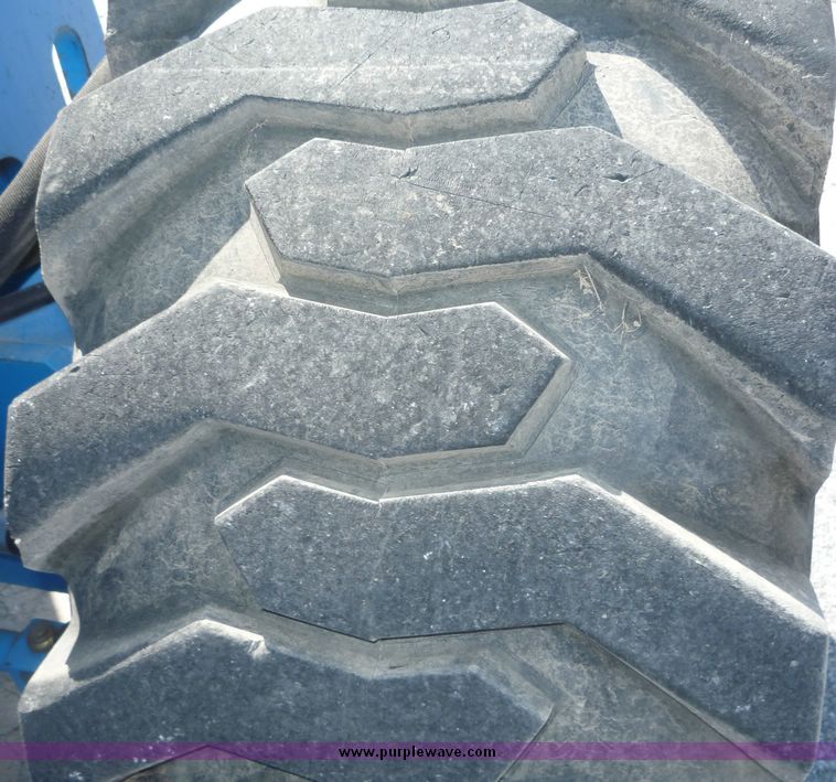 image for item 5061 Genie S-65 boom lift