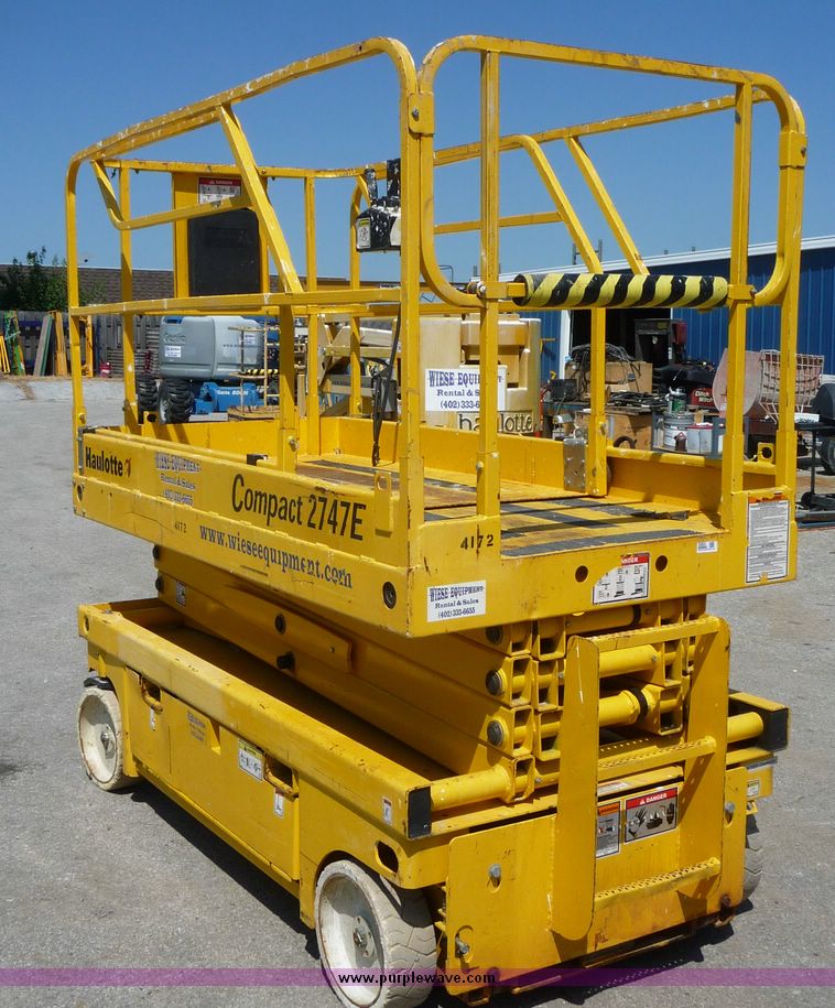 image for item 5065 2002 Haulotte 2747E compact scissor lift