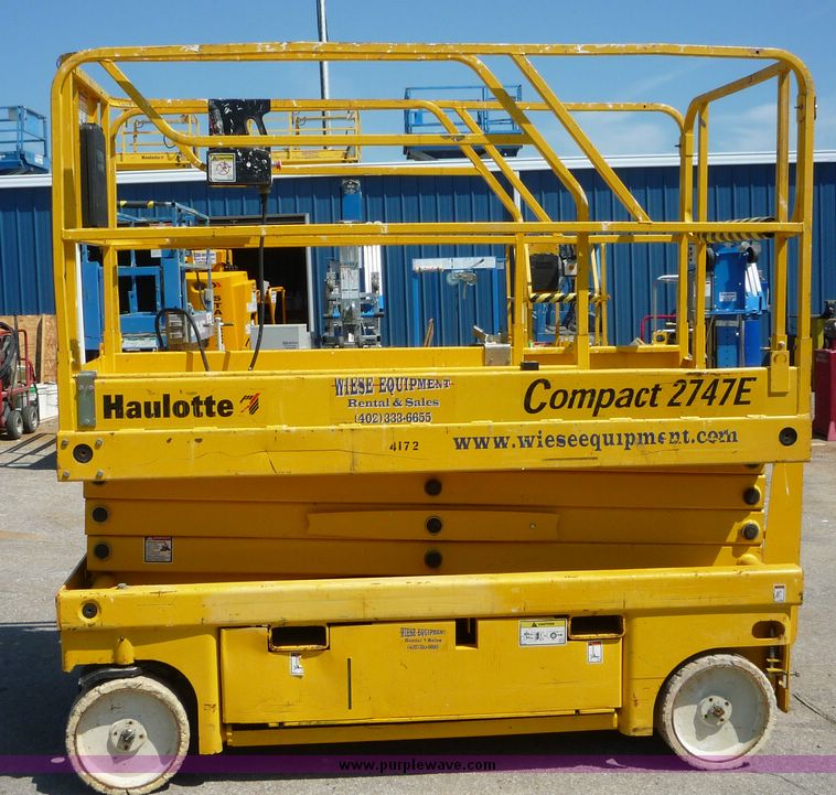 image for item 5065 2002 Haulotte 2747E compact scissor lift