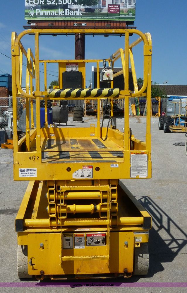 image for item 5065 2002 Haulotte 2747E compact scissor lift
