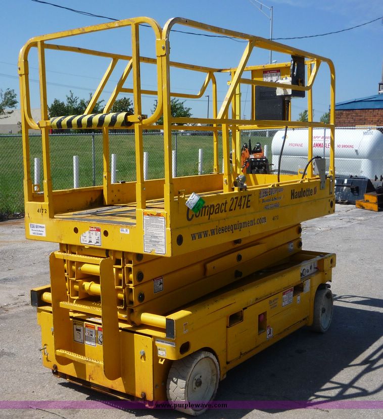 image for item 5065 2002 Haulotte 2747E compact scissor lift