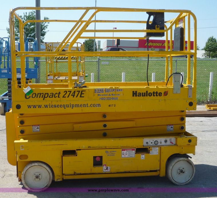image for item 5065 2002 Haulotte 2747E compact scissor lift