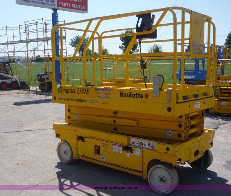 image for item 5065 2002 Haulotte 2747E compact scissor lift