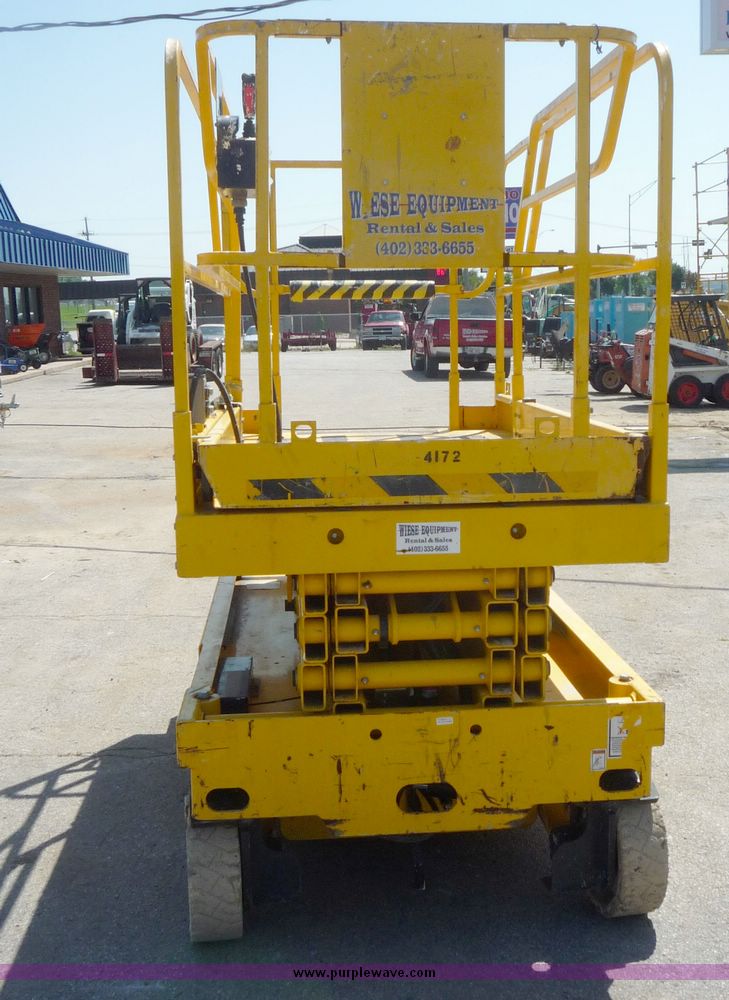 image for item 5065 2002 Haulotte 2747E compact scissor lift