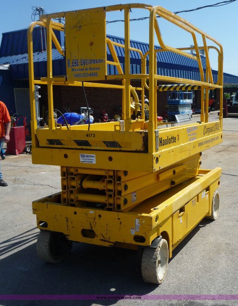 image for item 5065 2002 Haulotte 2747E compact scissor lift