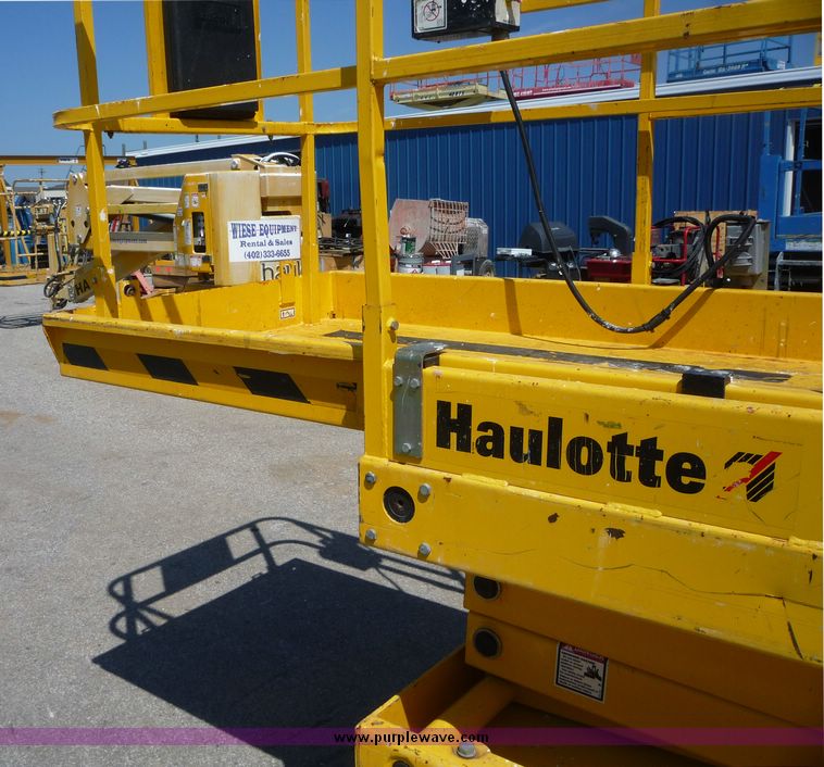 image for item 5065 2002 Haulotte 2747E compact scissor lift