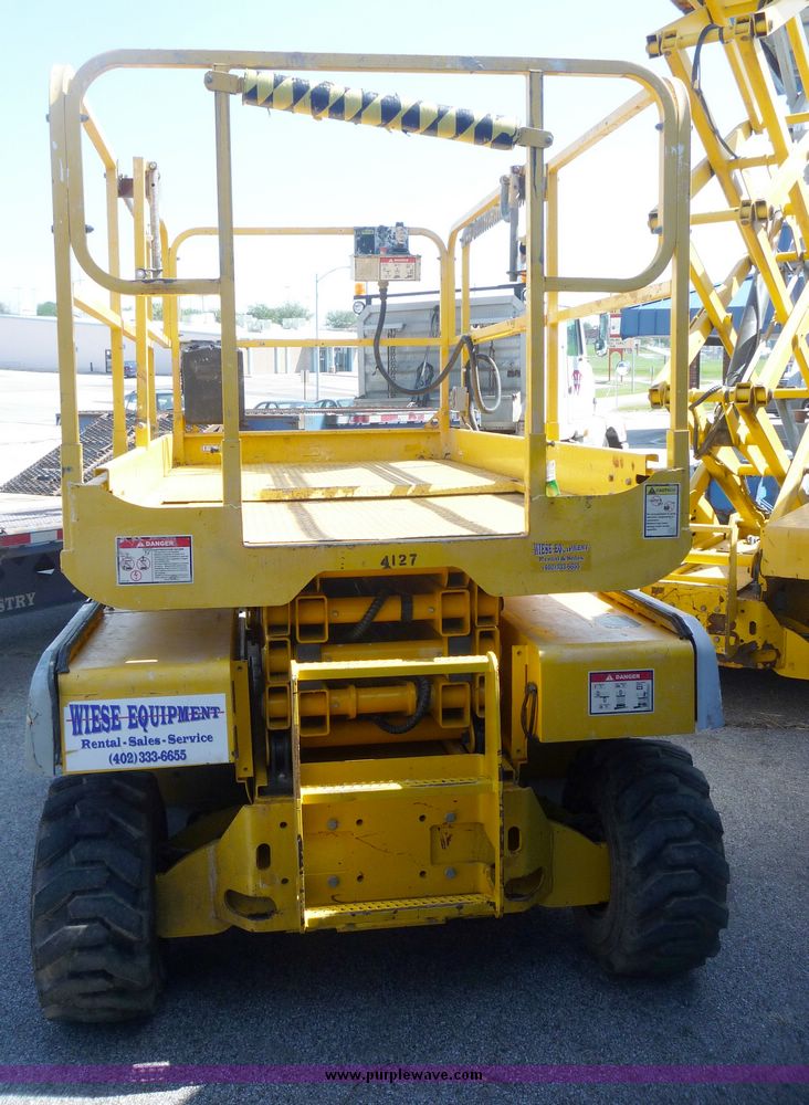 image for item 5072 2002 Haulotte 2668RT compact scissor lift