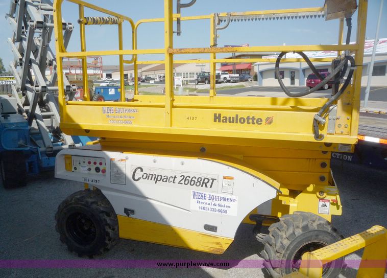 image for item 5072 2002 Haulotte 2668RT compact scissor lift