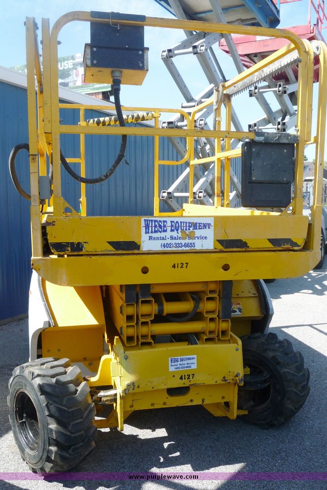 image for item 5072 2002 Haulotte 2668RT compact scissor lift