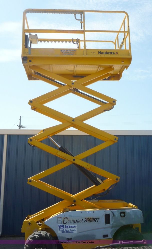 image for item 5072 2002 Haulotte 2668RT compact scissor lift