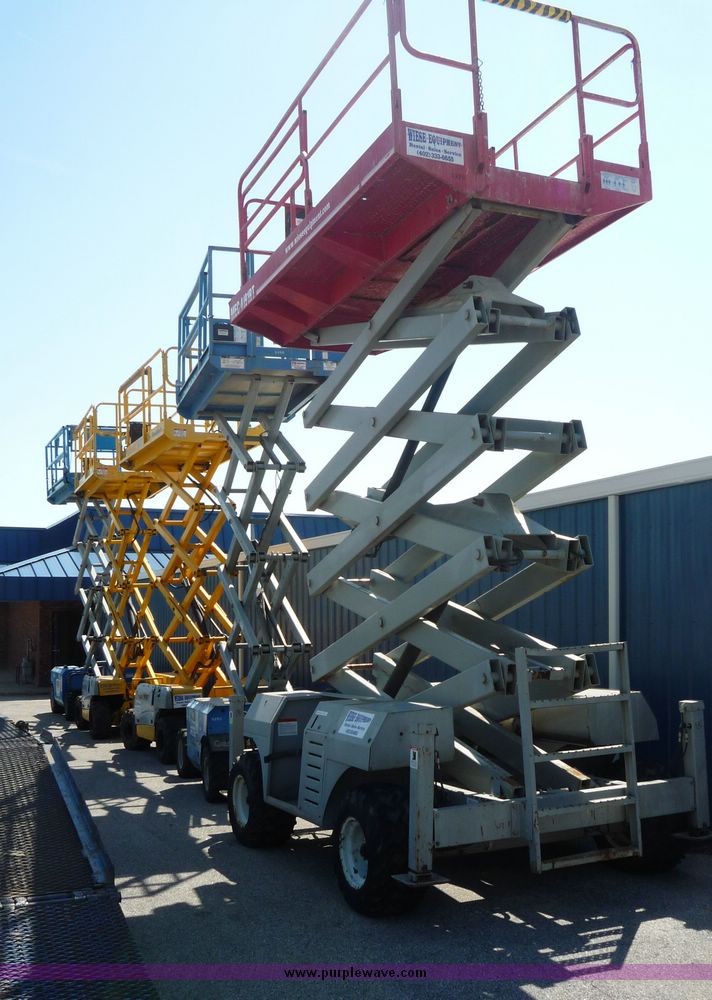 image for item 5072 2002 Haulotte 2668RT compact scissor lift
