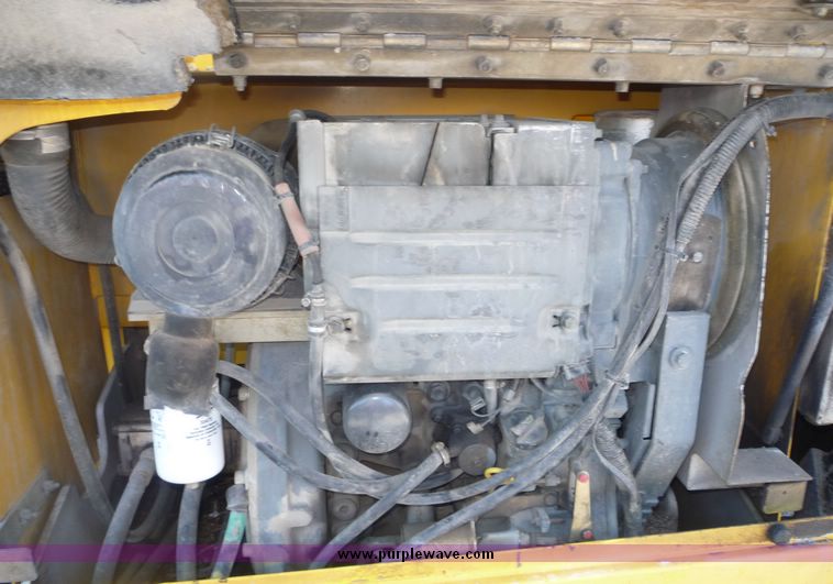 image for item 5072 2002 Haulotte 2668RT compact scissor lift