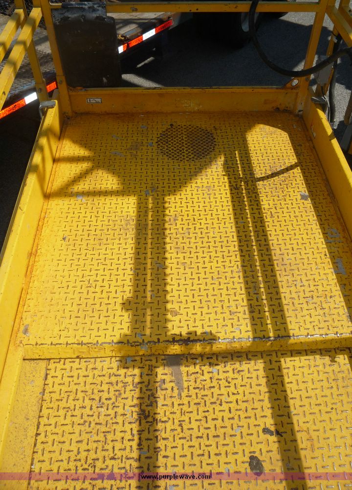 image for item 5072 2002 Haulotte 2668RT compact scissor lift